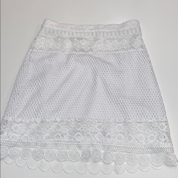 bebe Dresses & Skirts - White crochet mini skirt